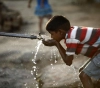 At the height of the drought, Egypt's drinking water leaks from perforated pipes