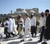 Settlers perform Talmudic rituals near one of the gates of Al-Aqsa