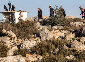 Settlers destroy a house under construction in Jericho