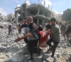 The aggression against Gaza continues despite the Baptist Hospital massacre