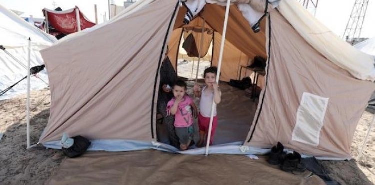 In pictures: UNRWA sets up a camp to shelter displaced people in the south of the Gaza Strip