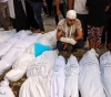 The Gaza Strip buries its martyrs in mass graves