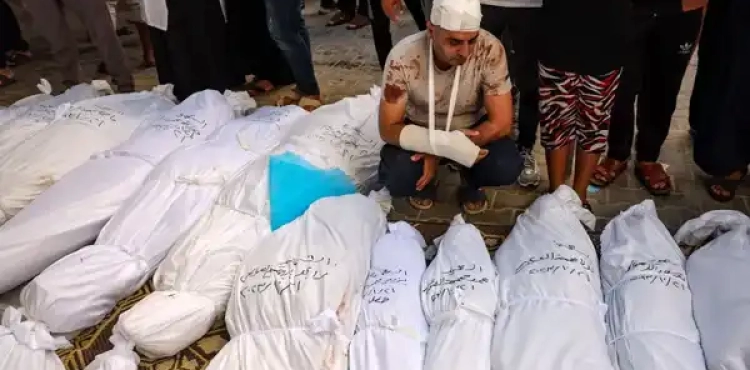 The Gaza Strip buries its martyrs in mass graves