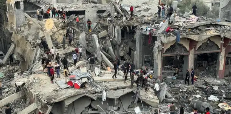 The bodies of martyrs were recovered from under the rubble in the Shujaiya neighborhood