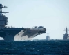 The drums of war are beating... The United States is sending an aircraft carrier to the Middle East.