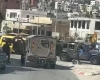 Israeli forces raid the town of Tuqu' in Bethlehem and search two homes.