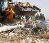 Israeli occupation forces demolish tints of farmers and confiscate their products in Beit Halhoul