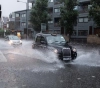 Water floods streets and underground stations in London due to thunderstorms