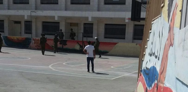 The Israeli army is attacking a Palestinian school and arresting three of its requests.