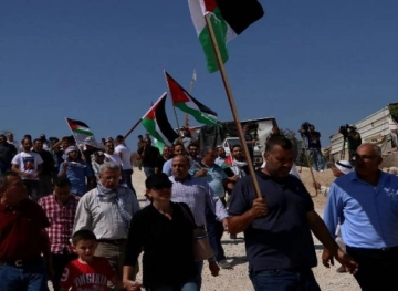 Palestinian rally condemning the Occupation&acute;s decision to demolish and displace  &quot;red Khan &quot;