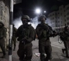 The occupation arrested 14 civilians and summoned 4 others