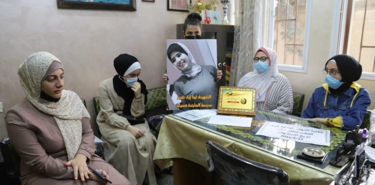 A mixed feeling between joy and sadness for Gaza school students while receiving their certificates after losing their classmates
