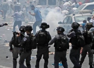 Clashes with the occupation forces at the eastern entrance to the village of Mughayir, east of Ramallah