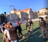 The occupation stormed a party honoring students in Issawiya