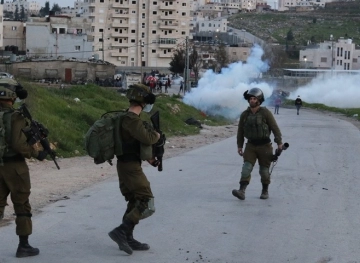 Two young men were injured by two gas bombs following the occupation&acute;s suppression of the Kafr Qaddum march