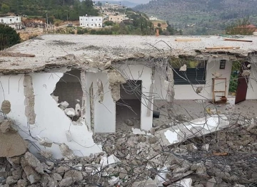 Photos | The occupation destroys a house in Walajah