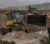 The occupation bulldozes lands and uproots olive trees in Al-Khader