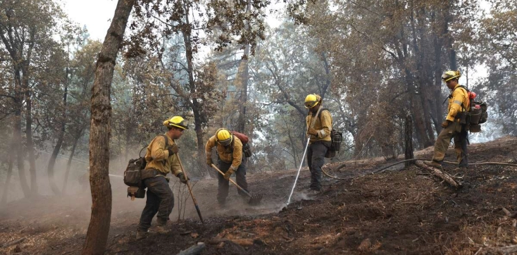 California.. Thousands evacuated as &quot;devastating&quot; fire spreads