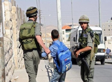 The occupation arrests a child in Jerusalem