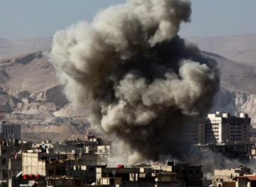 Israeli raids on Syria and Israel announced intercepting missiles fired at the Golan Heights