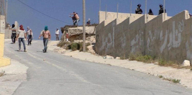 Settlers attack the Auref school
