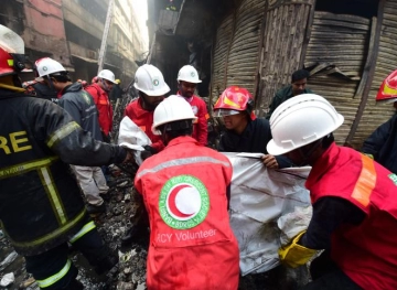 At least 69 dead in a huge fire in Dhaka