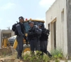 The Occupation delivers notices to halt the construction of a number of houses in Hebron