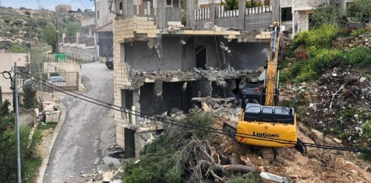 The occupation destroys a residential building in Bir Aoun on the pretext of not authorizing