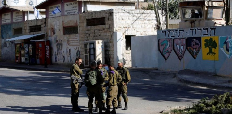 The arrest of a girl near the Cave of the Patriarchs