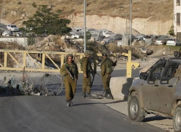 The occupation of several military checkpoints in Jenin