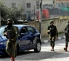 13 detainees, including a lady, confiscating weapons and thousands of shekels