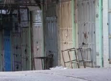 Settlers seize a shop in the Old City of Hebron