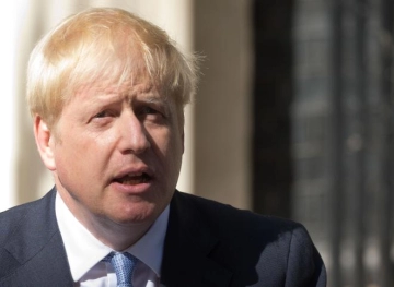 Johnson promises to leave the EU on Oct. 31 &quot;whatever the cost&quot;