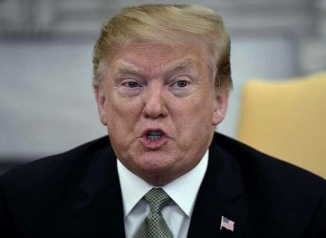 Trump defends his criticism of a black MP