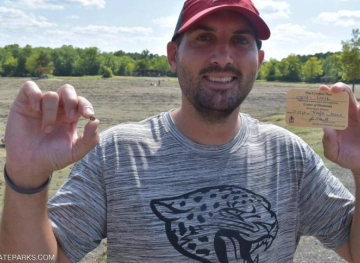 Luck smiles at an American teacher on his summer vacation