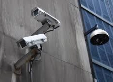 Develop clothes that mislead surveillance cameras and turn man into a car
