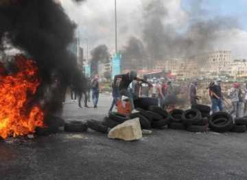 Seriously wounded by Israeli gunfire north of al-Bireh