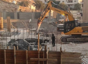 The occupation demolishes two buildings under construction in Eizariya