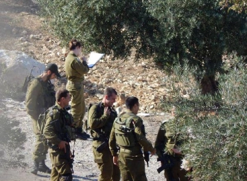Settlers protected by Israeli soldiers storm the &quot;Khirbet Taqwa archaeological&quot; east of Bethlehem