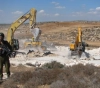 Settlers bulldoze land from Kafr Laqaf village