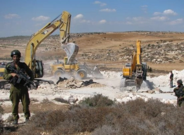 Settlers bulldoze land from Kafr Laqaf village