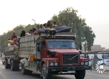 More than 2,300 people are fleeing to Iraq to escape fighting in northeastern Syria