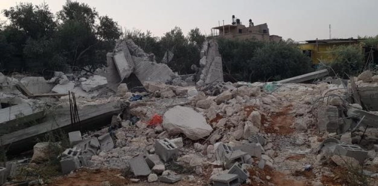 The occupation demolishes a house under construction in Taibeh