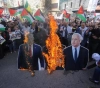 Angry protesters burn trumpets of Trump, Netanyahu and Pompeo in the center of Nablus