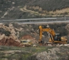 The occupation swept dozens of acres in Husan