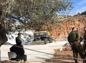Israeli forces demolish a facility in Walaja