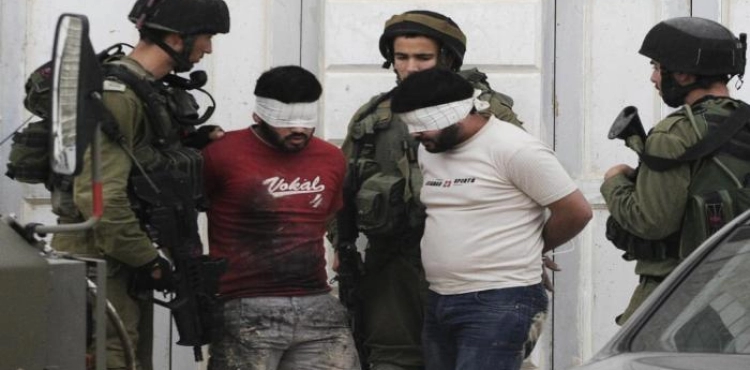 The Israeli army arrested 4 young men at two military checkpoints