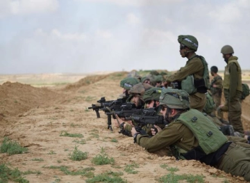 Occupation arrests a young man after he was wounded in southern Gaza