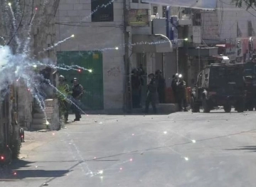 Cases of suffocation after the occupation forces targeted a mosque and houses with gas bombs in Beit Ummar