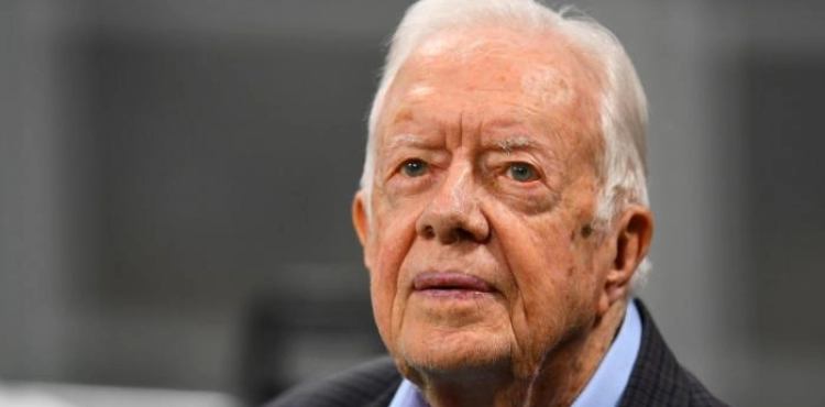 Carter condemns the &quot;deal of the century&quot; plan and urges the world to reject it